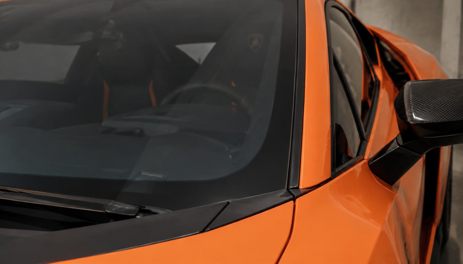 Lamborghini Revuelto windshield close-up — protected with XPEL windshield film